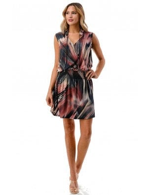 Woman wearing a sleeveless dress with a colorful abstract pattern on a white background