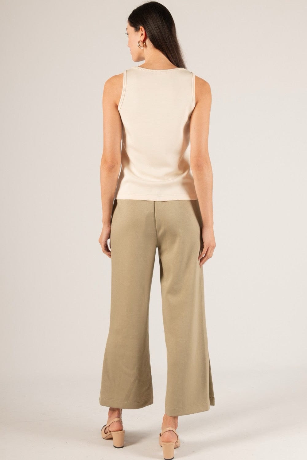 Back view of the P Cill Butter Modal Tank, showcasing its clean lines, seamless finish, and comfortable, figure-hugging fit.