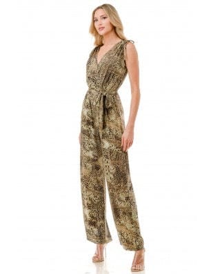 Woman wearing a patterned jumpsuit on a white background