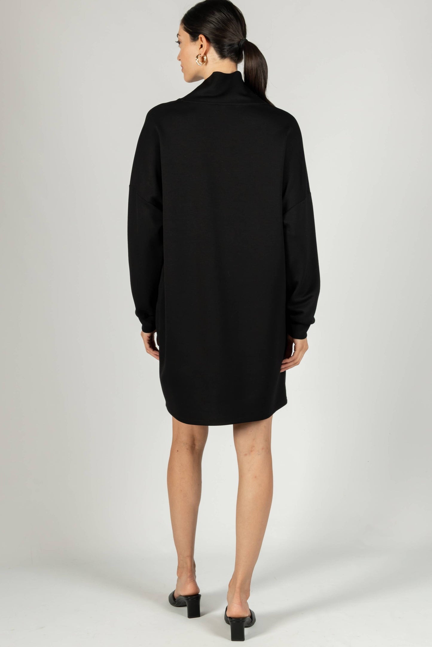 Back view of the P Cill Butter Modal Cowl Neck Dress, showcasing its seamless finish and relaxed yet sophisticated fit.