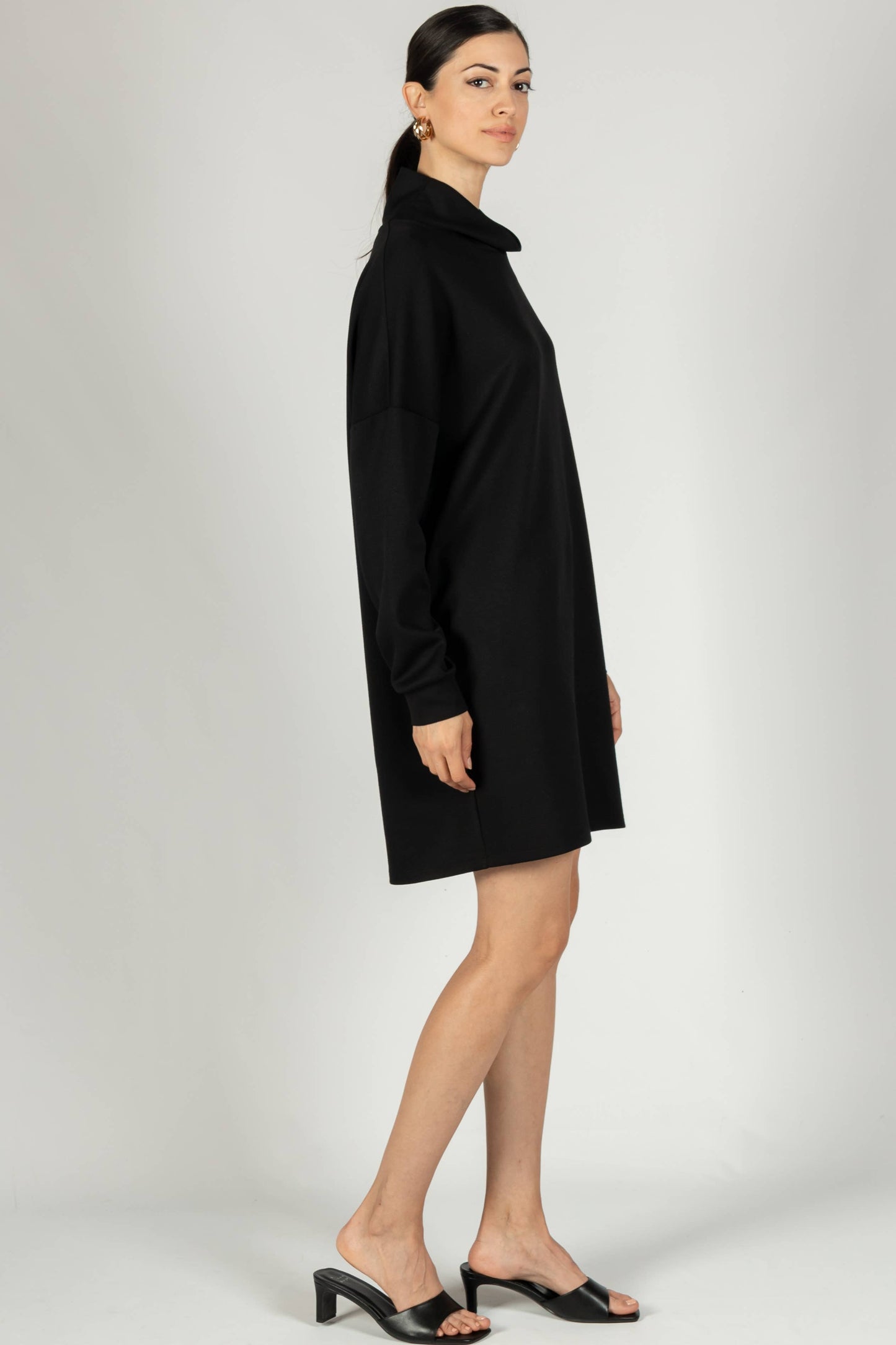 Side profile of the P Cill Butter Modal Cowl Neck Dress, highlighting the elegant drape of the cowl neck and the soft stretch fabric.