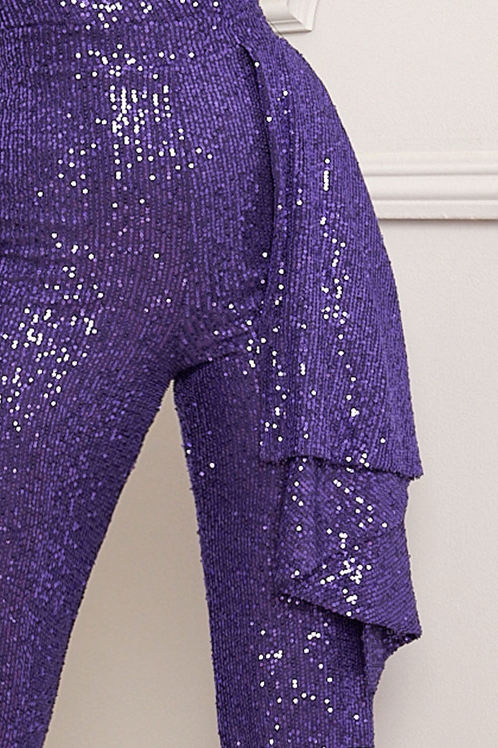 Glamorous Ella’s Sequin Tube Top Jumpsuit with sequin-embellished top and tailored pants for an elegant, statement look."